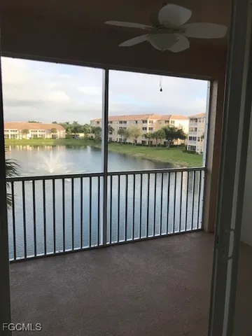 a view of balcony with furniture
