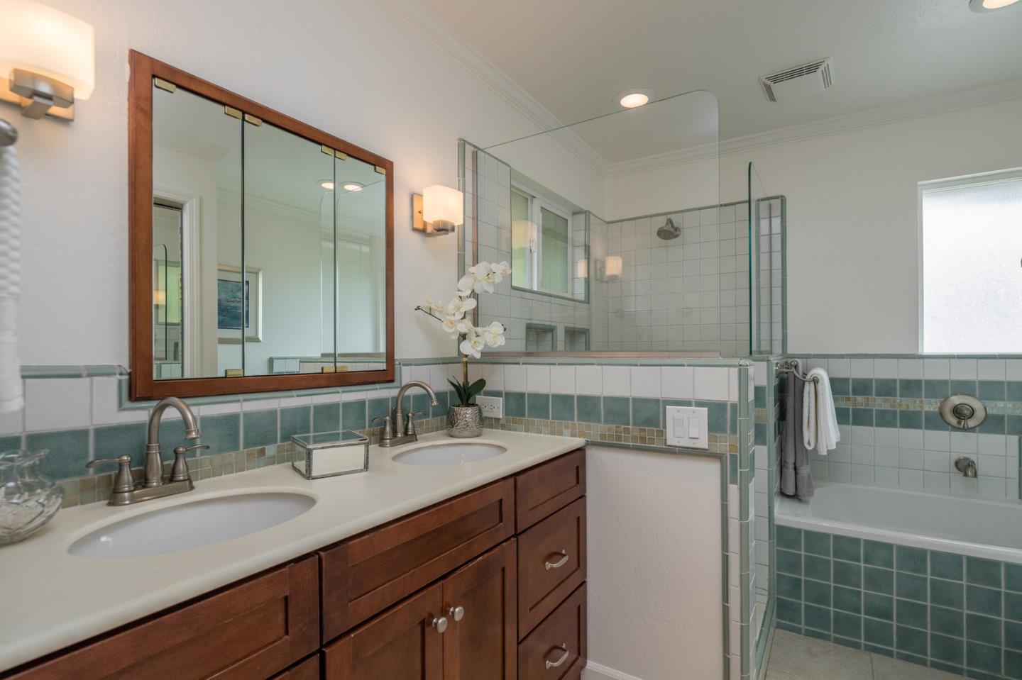 415 Middle Road Belmont, CA 94002 - Photo 17 of 32 a bathroom with a double vanity sink mirror and double