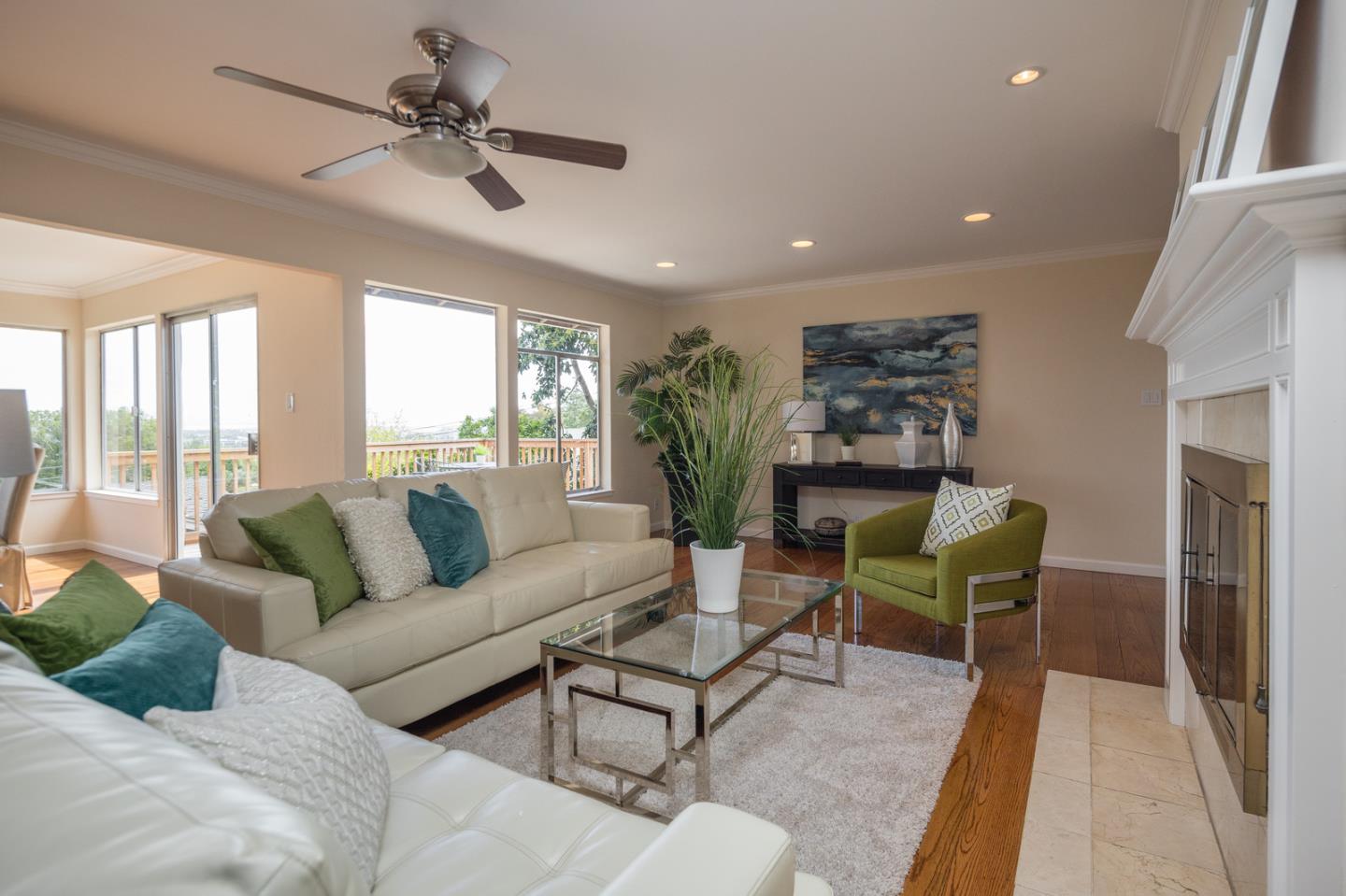 415 Middle Road Belmont, CA 94002 - Photo 8 of 32 a living room with furniture and a large window