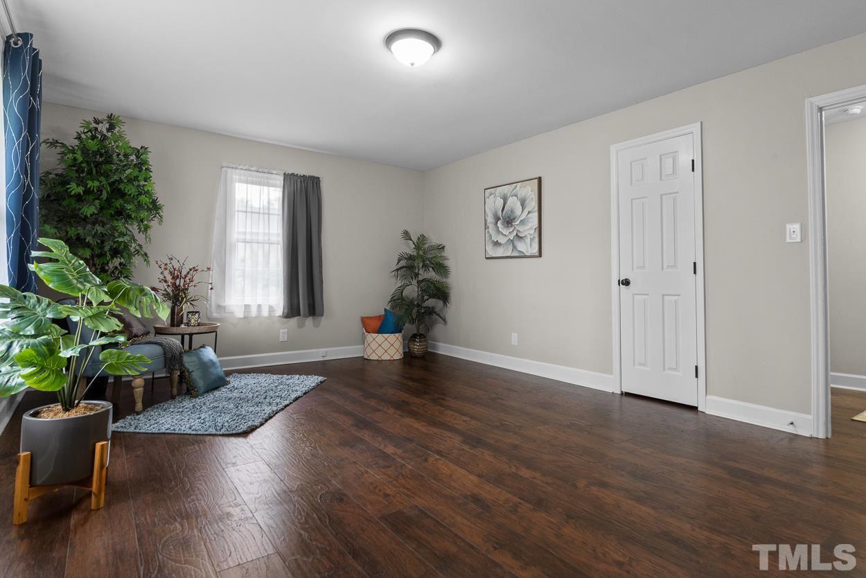 5314 Fayetteville Road Durham, NC 27713 - Photo 2 of 24 a view of empty room with wooden floor