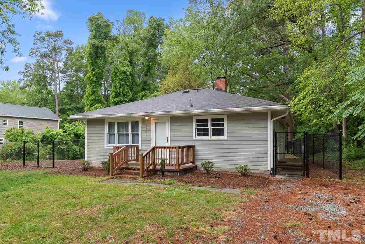 5314 Fayetteville Road Durham, NC 27713 - Photo 20 of 24 a view of a house with backyard