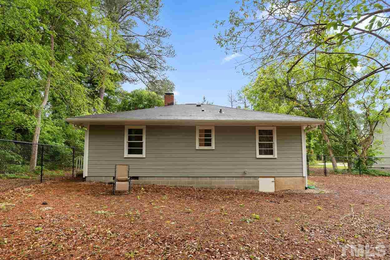 5314 Fayetteville Road Durham, NC 27713 - Photo 22 of 24 a backyard of a house with lots of green space