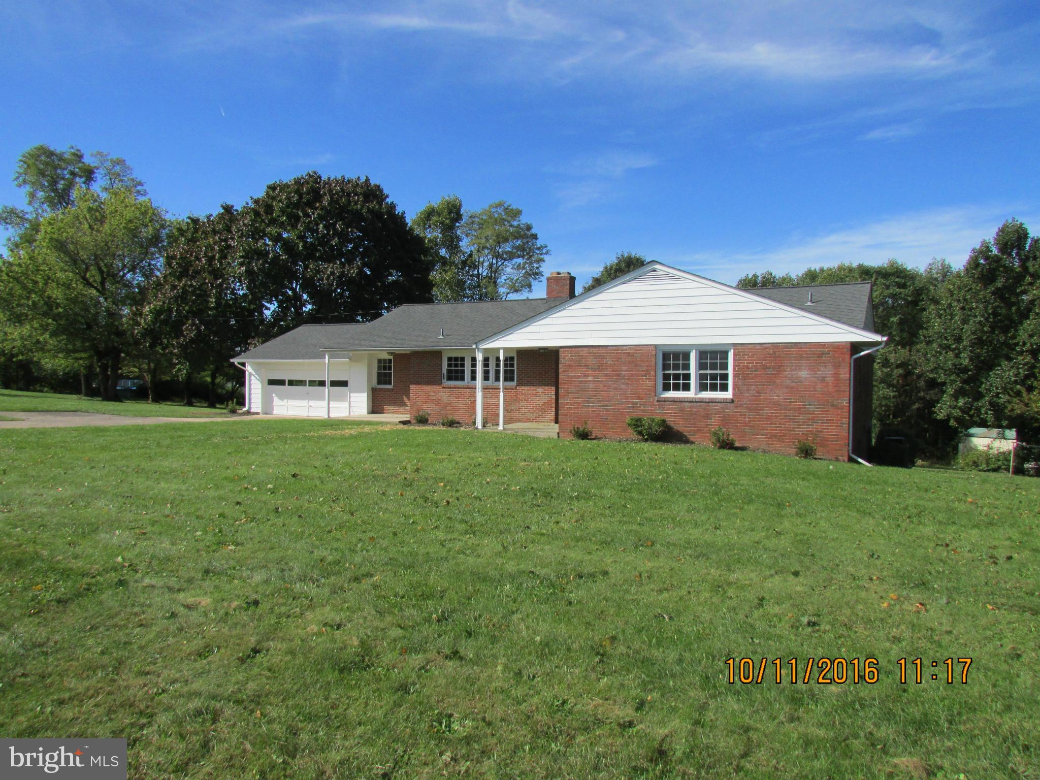 9250 Brown Church Road Mount Airy, MD 21771 - Photo 2 of 23 a front view of a house with a yard