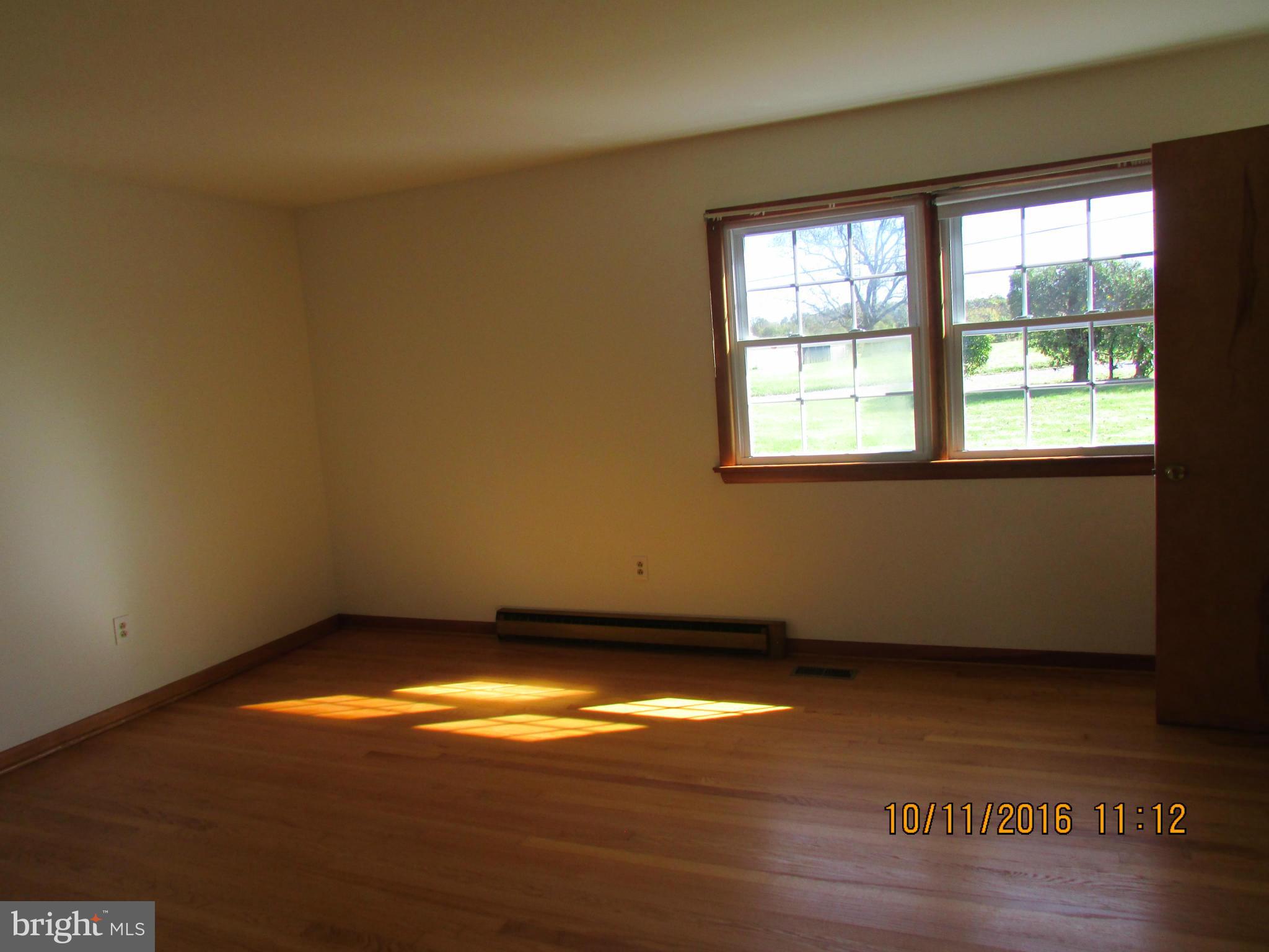 9250 Brown Church Road Mount Airy, MD 21771 - Photo 12 of 23 an empty room with an empty space and a window