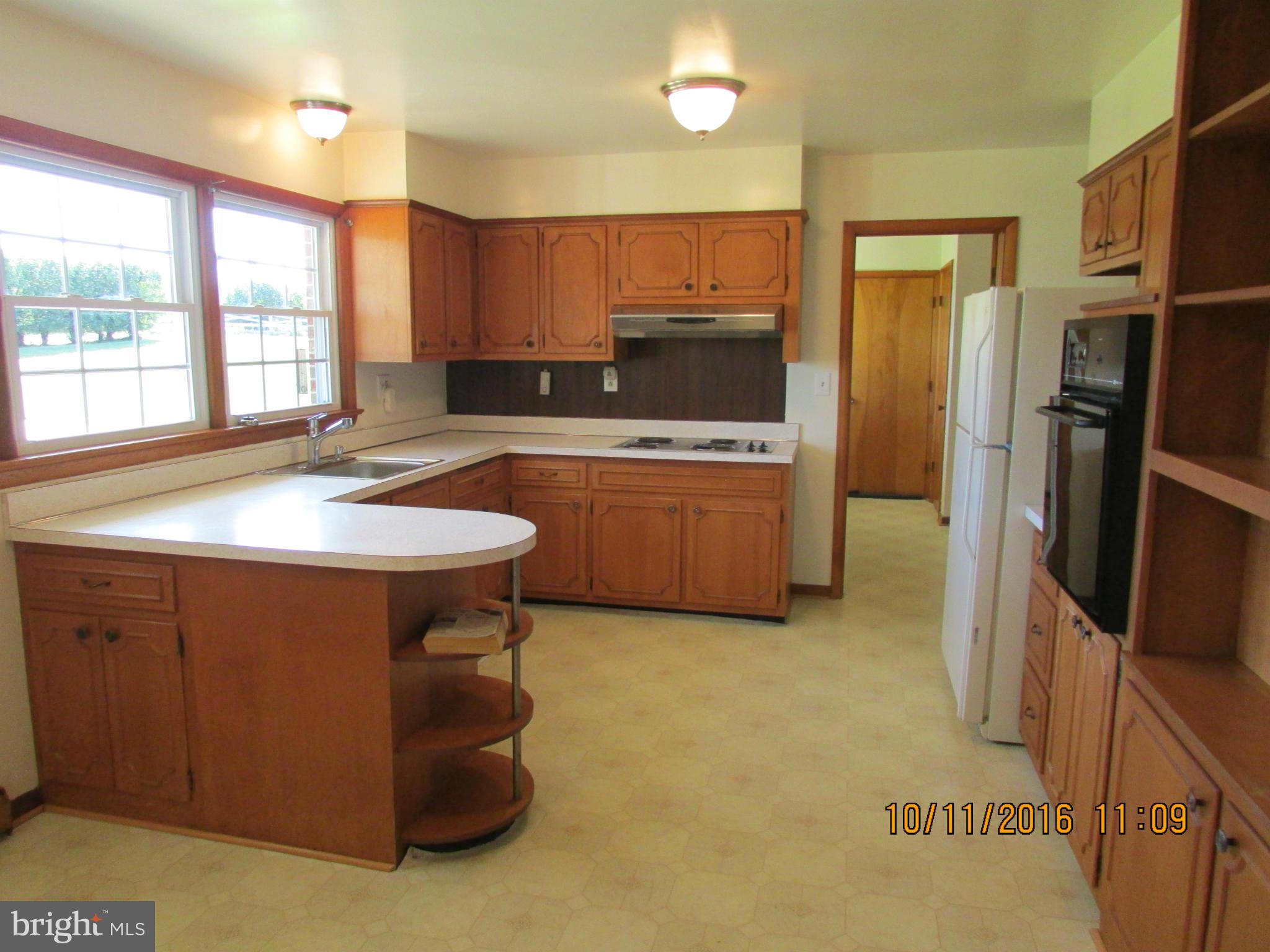 9250 Brown Church Road Mount Airy, MD 21771 - Photo 3 of 23 a kitchen with stainless steel appliances granite countertop a sink a stove a refrigerator and island