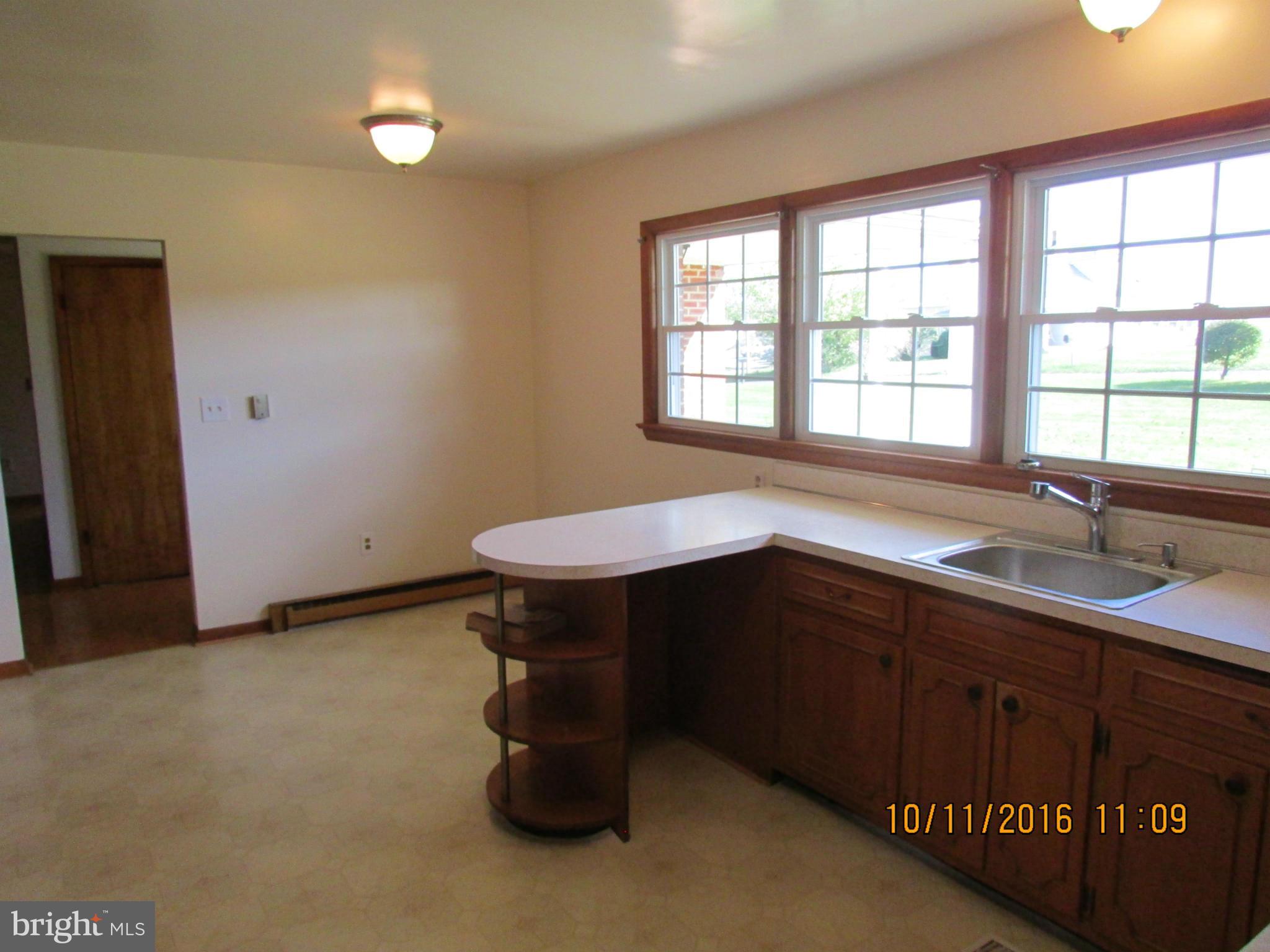9250 Brown Church Road Mount Airy, MD 21771 - Photo 5 of 23 a kitchen with a sink and a window