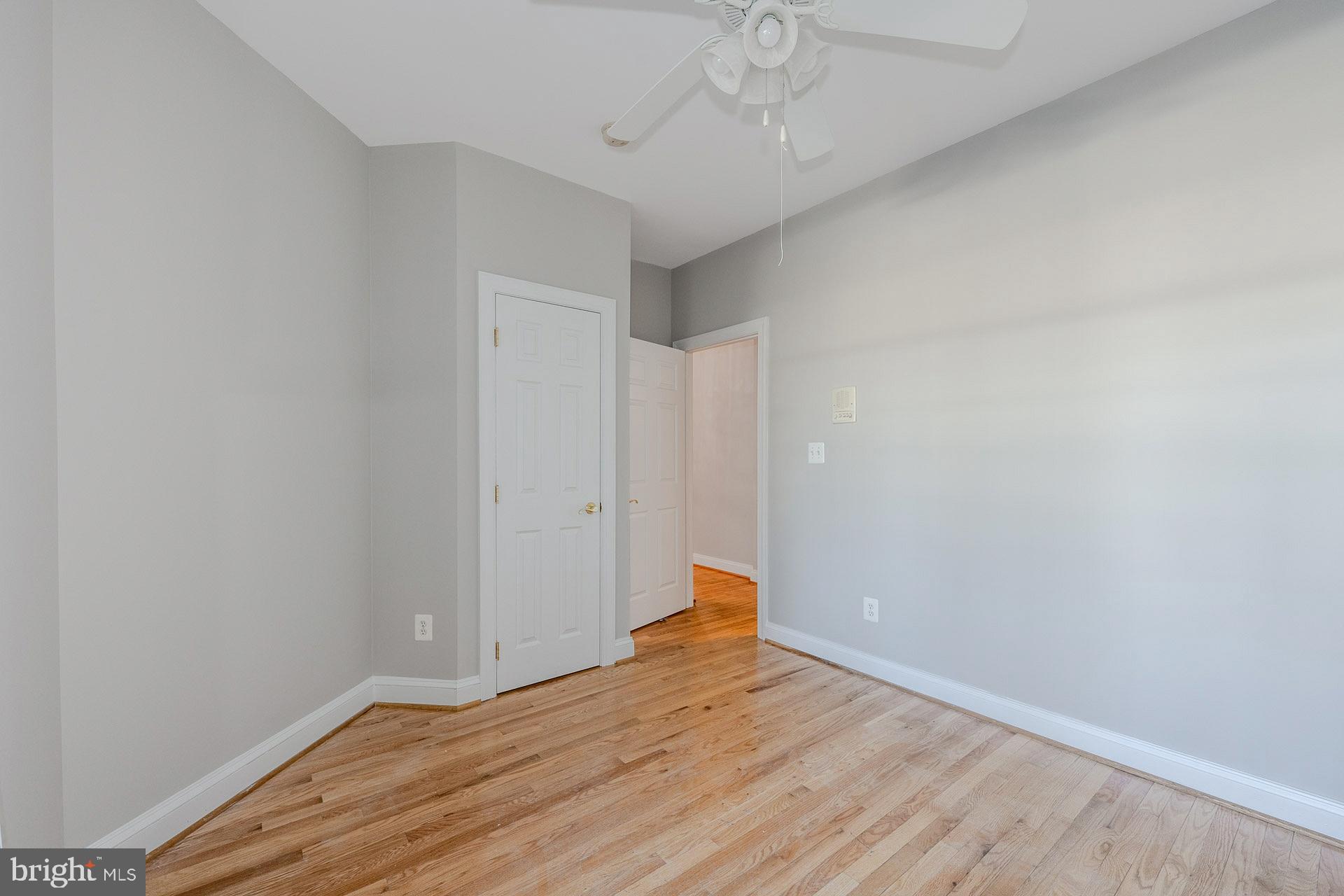 172 Ruffed Grouse Court White Post, VA 22663 - Photo 13 of 62 a view of an empty room with wooden floor