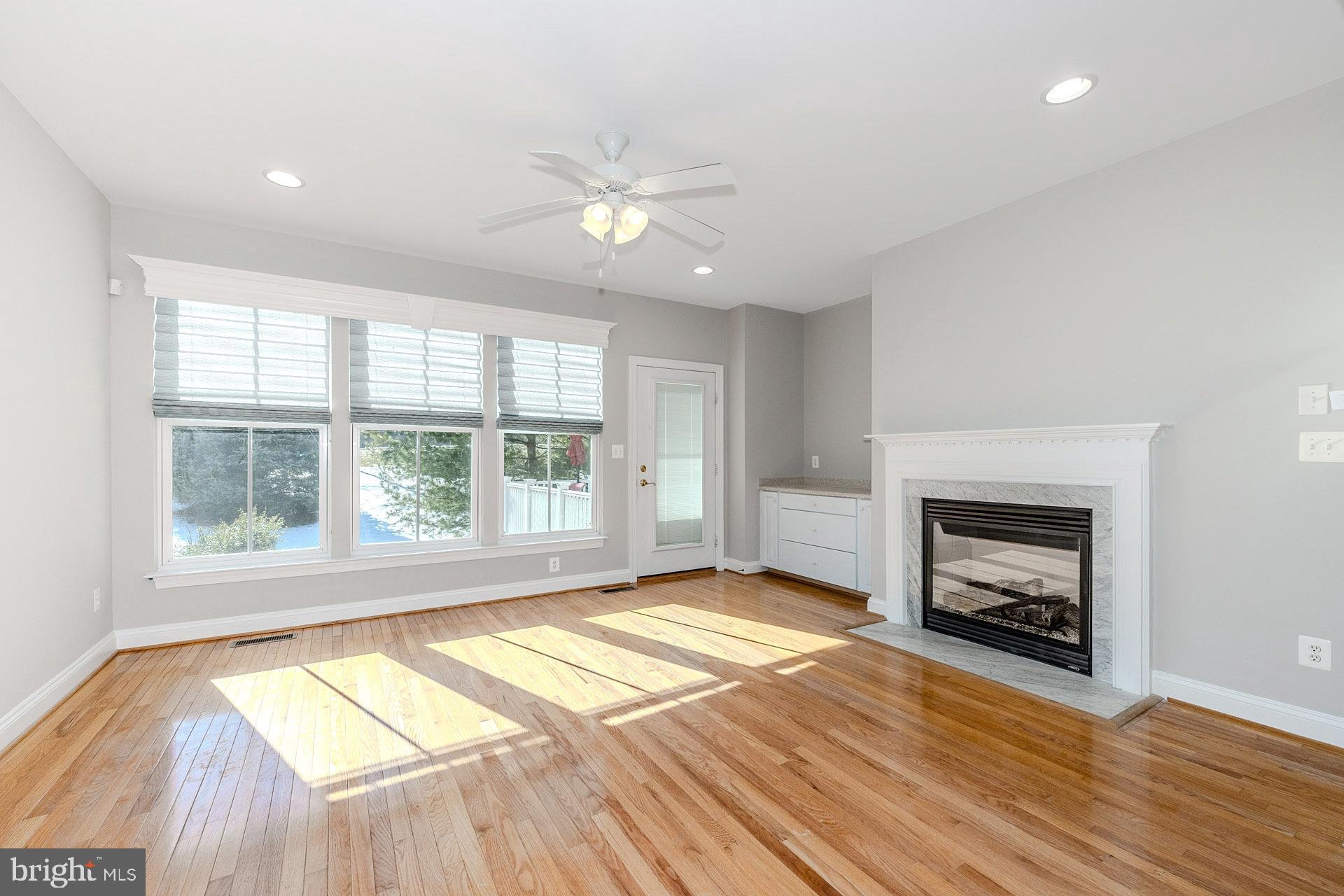 172 Ruffed Grouse Court White Post, VA 22663 - Photo 19 of 62 a view of an empty room with a window and fireplace