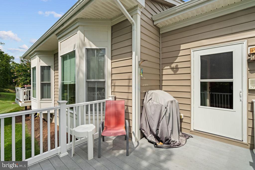 172 Ruffed Grouse Court White Post, VA 22663 - Photo 22 of 62 a view of a chair and table in the balcony