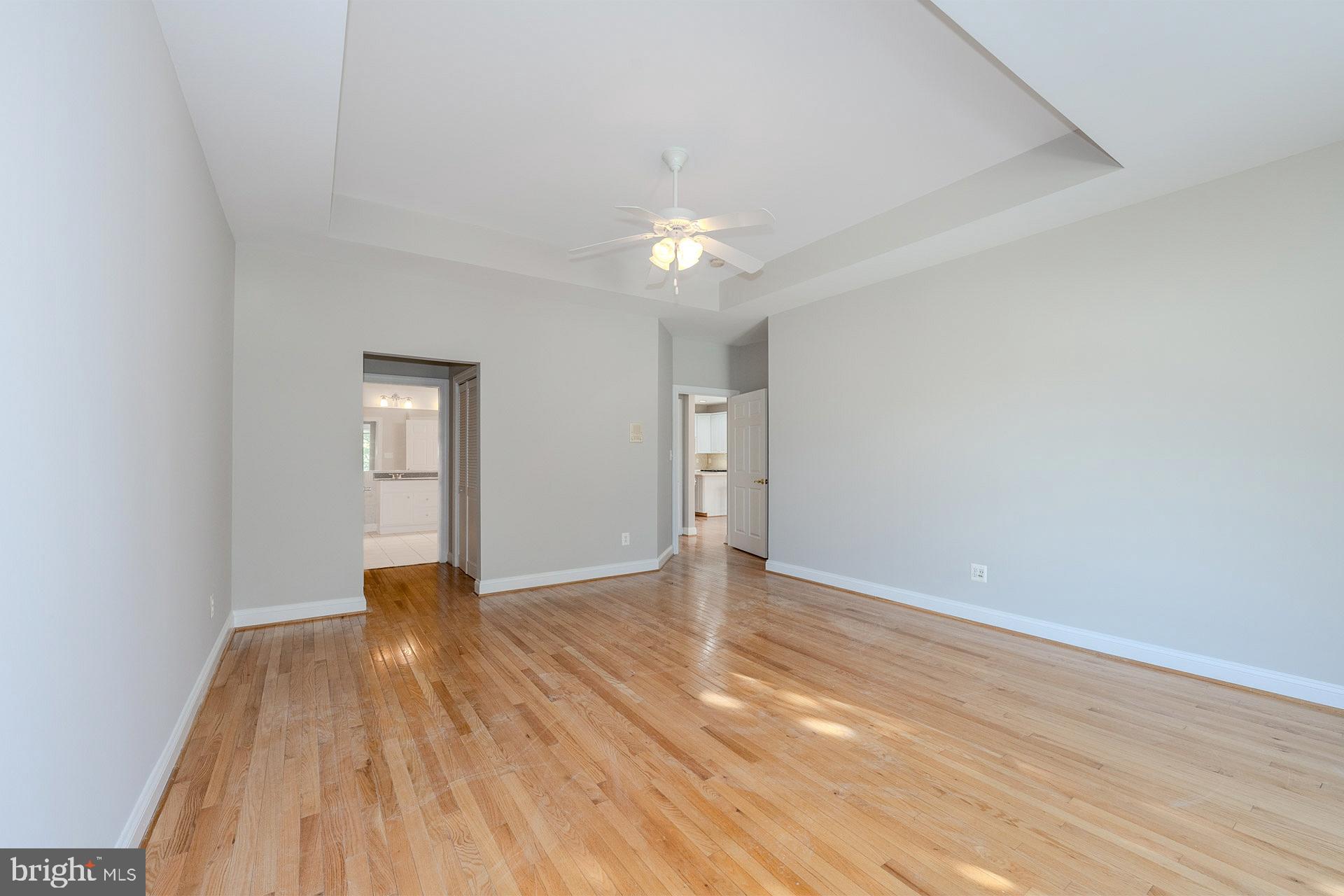 172 Ruffed Grouse Court White Post, VA 22663 - Photo 25 of 62 wooden floor in an empty room with a window