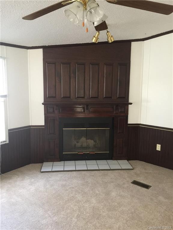 136 Morrison Road Mocksville, NC 27028 - Photo 3 of 14 a living room with a fireplace