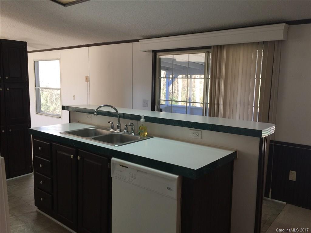 136 Morrison Road Mocksville, NC 27028 - Photo 7 of 14 a bathroom with a sink and a mirror