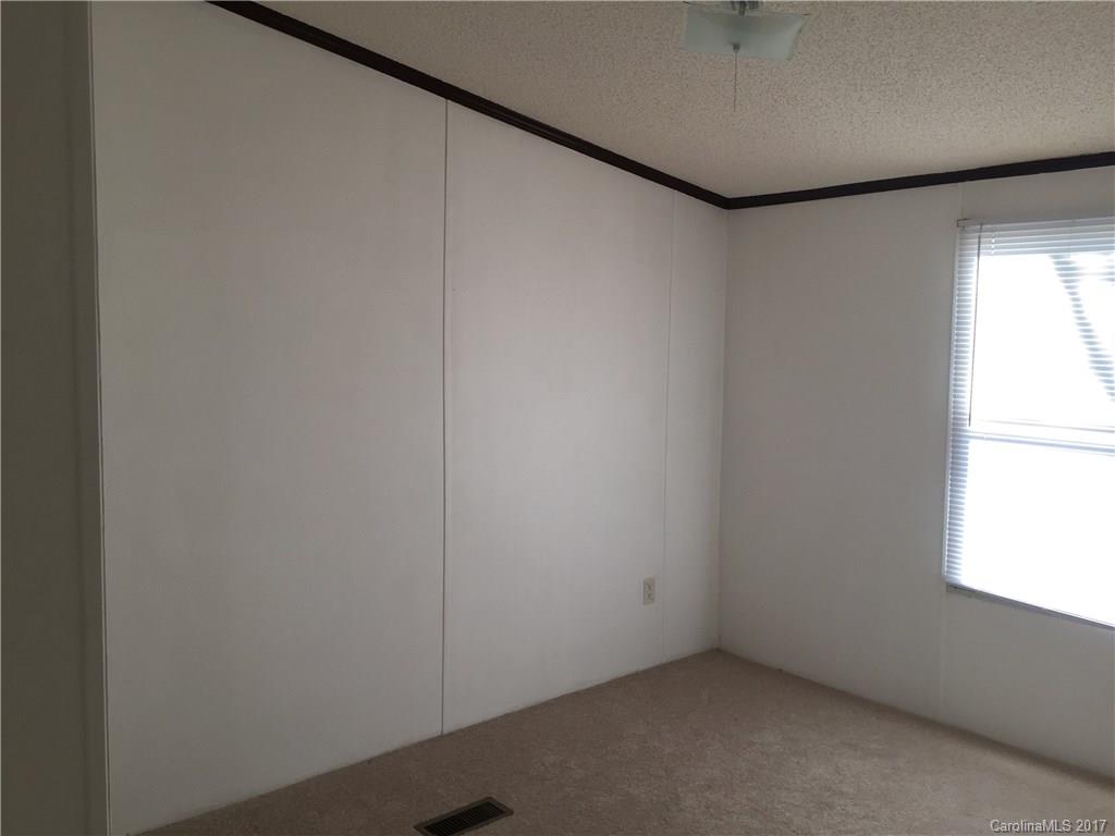 136 Morrison Road Mocksville, NC 27028 - Photo 9 of 14 a view of an empty room and a window