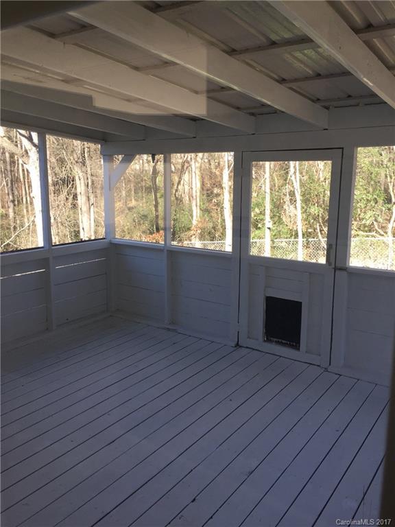 136 Morrison Road Mocksville, NC 27028 - Photo 10 of 14 a view of an empty room with wooden floor and a window