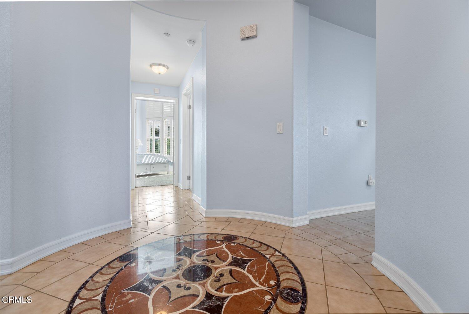 1481 Windshore Way Oxnard, CA 93035 - Photo 15 of 31 wooden floor in a empty room