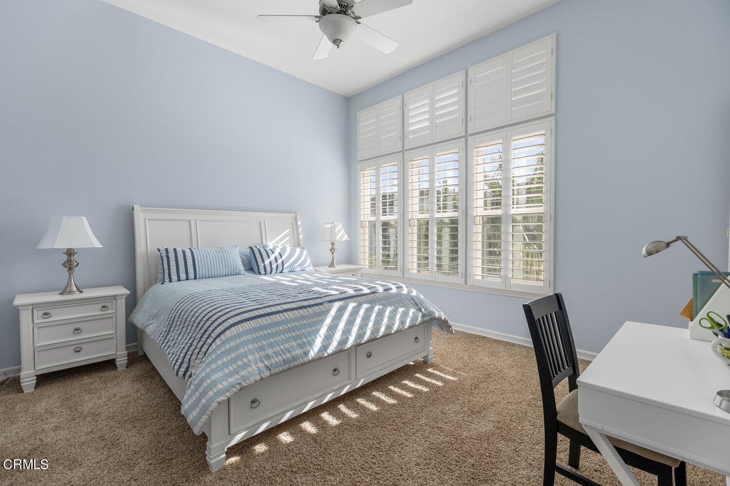 1481 Windshore Way Oxnard, CA 93035 - Photo 16 of 31 a bedroom with a bed chair and a window