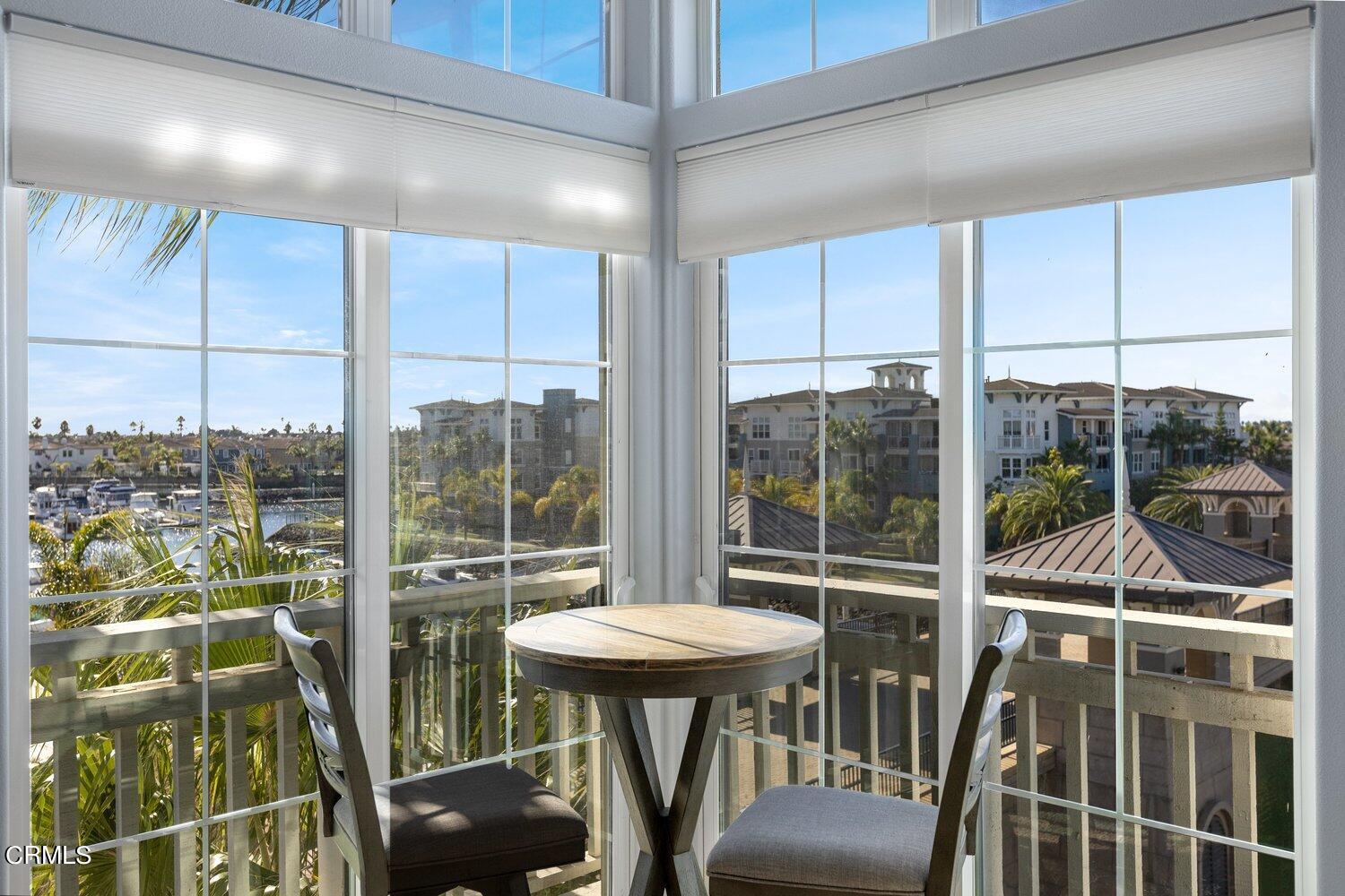 1481 Windshore Way Oxnard, CA 93035 - Photo 3 of 31 a view of a room with balcony and furniture