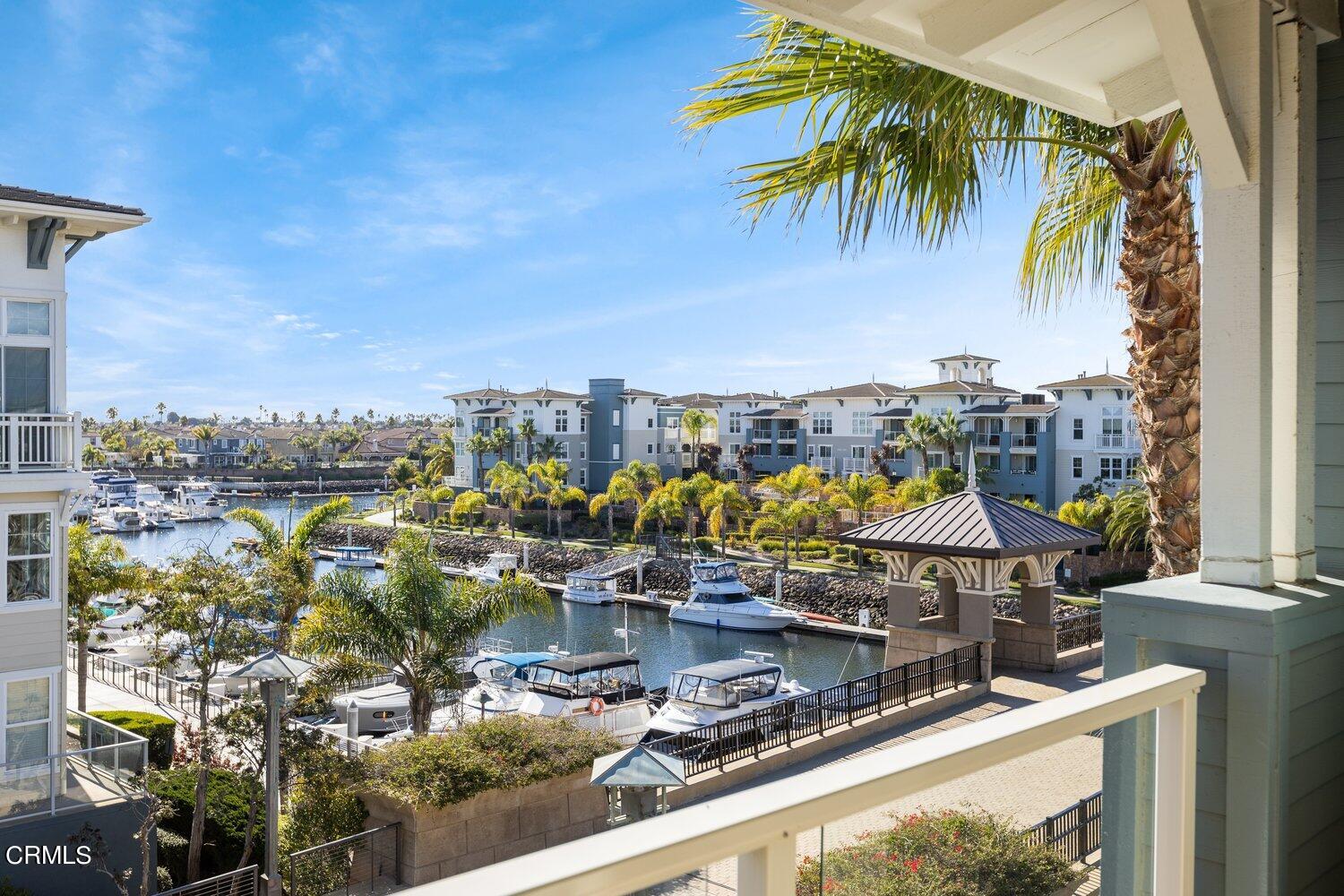 1481 Windshore Way Oxnard, CA 93035 - Photo 4 of 31 a view of a lake with a city