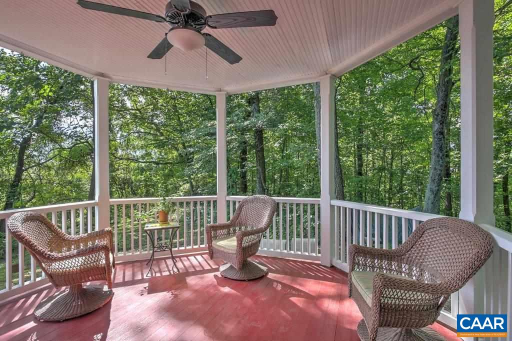 528 Top Ridge Road Stanardsville, VA 22973 - Photo 32 of 45 a view of a chair in a patio