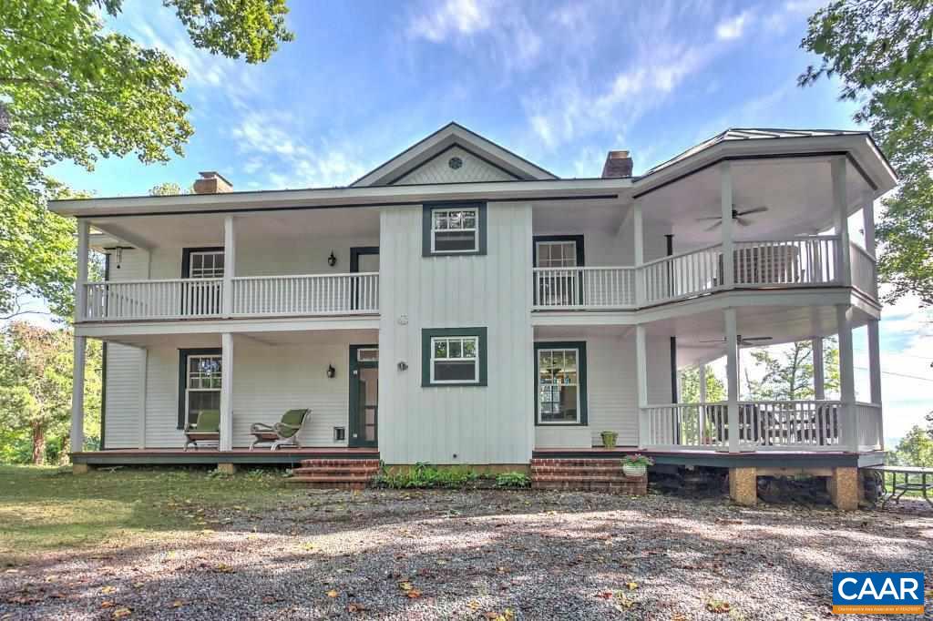 528 Top Ridge Road Stanardsville, VA 22973 - Photo 4 of 45 a front view of a house with garden