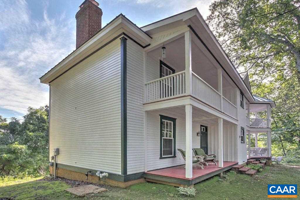 528 Top Ridge Road Stanardsville, VA 22973 - Photo 5 of 45 a front view of a house with a yard