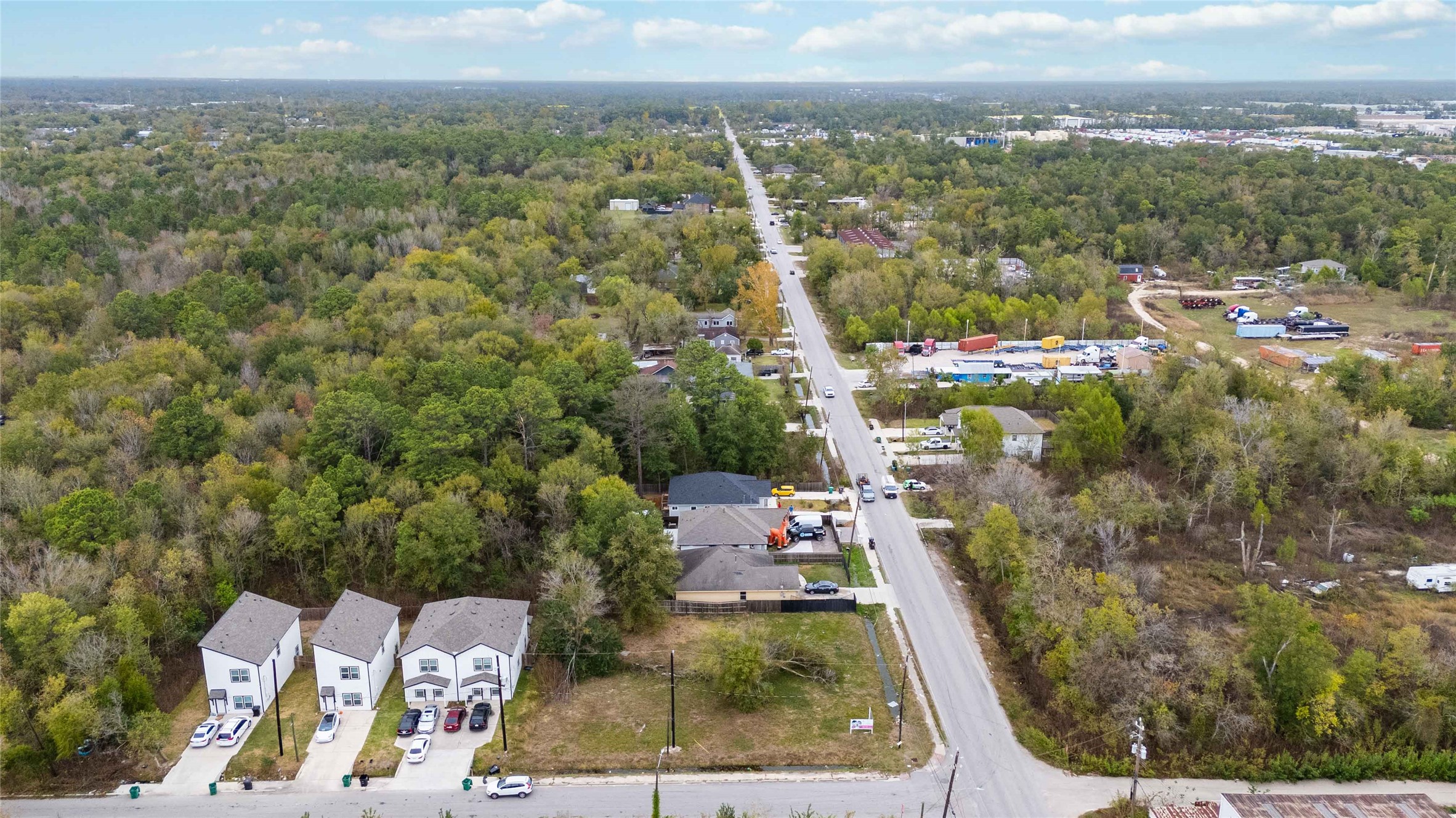 5403 East Houston Road Houston, TX 77028 - Photo 7 of 8 an aerial view of residential houses with outdoor space and trees