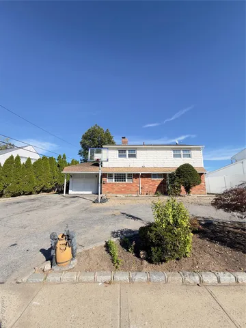 a picture of a couple of people sitting in snow