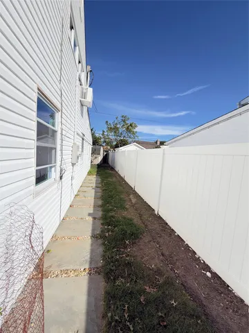 a view of a road with a building in the background