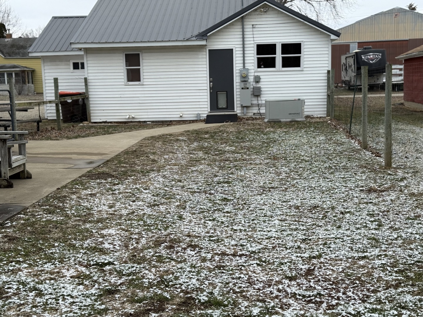 411 Jefferson Street Henry, IL 61537 - Photo 3 of 17 a view of a house with a yard