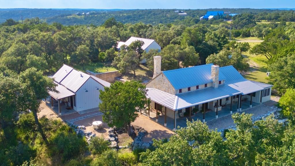 an aerial view of a house with a garden