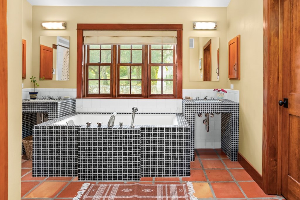 309 Ridgeview Drive Fredericksburg, TX 78624 - Photo 19 of 32 a bathroom with a sink and a shower