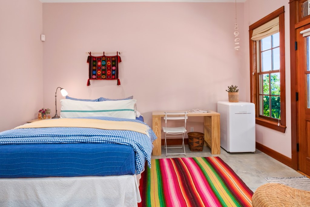 309 Ridgeview Drive Fredericksburg, TX 78624 - Photo 25 of 32 a bedroom with a bed and a table