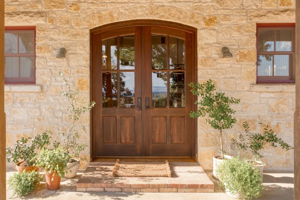309 Ridgeview Drive Fredericksburg, TX 78624 - Photo 5 of 32 a front view of a house with a yard