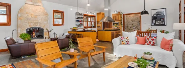 a living room with patio area and a couch