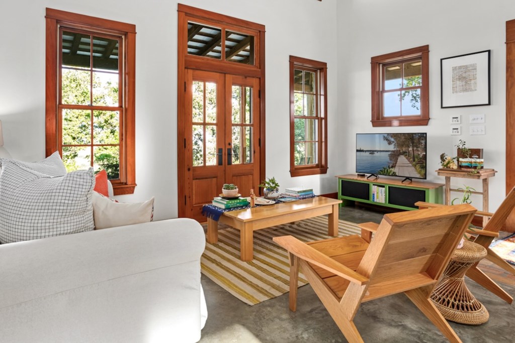 309 Ridgeview Drive Fredericksburg, TX 78624 - Photo 10 of 32 a living room with furniture and large windows