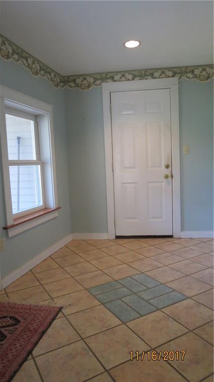 191 Edes Falls Road Naples, ME 04055 - Photo 16 of 33 Mudroom leads to the side porch on...
