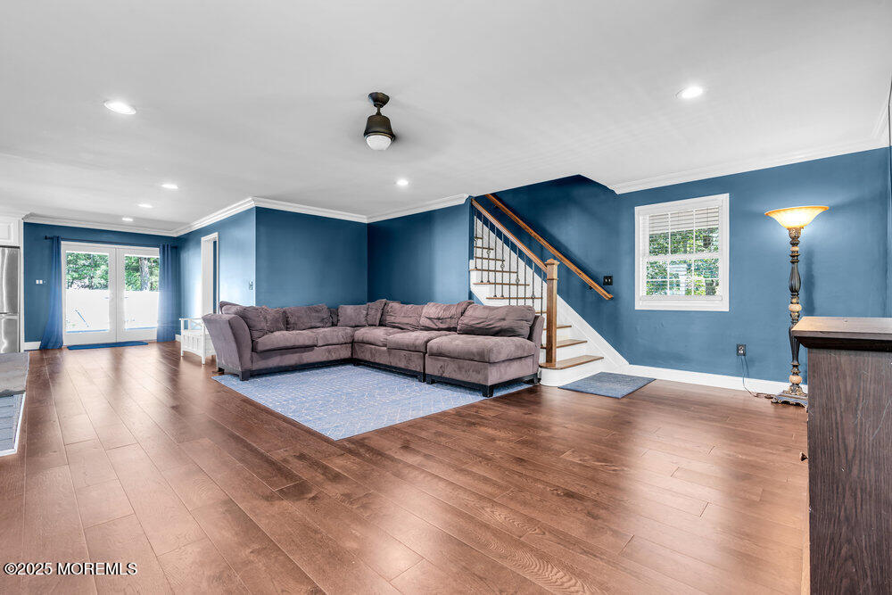 225 East Bird Village Road Jackson, NJ 08527 - Photo 11 of 69 a living room with furniture and a wooden floor