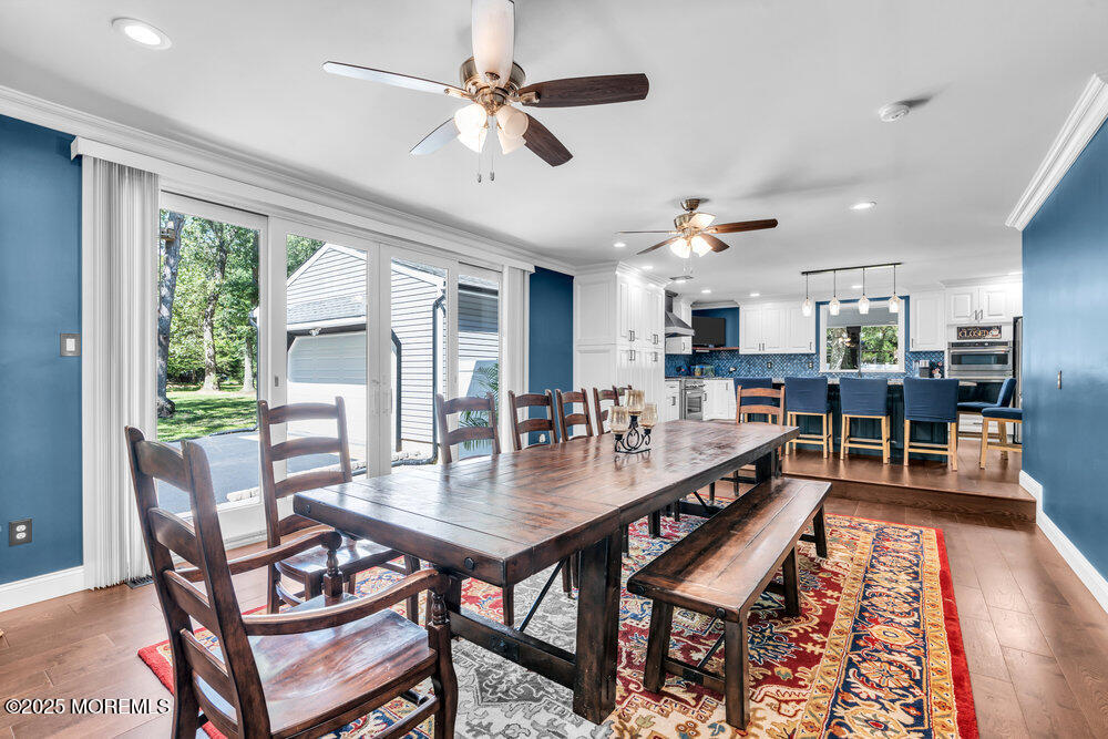 225 East Bird Village Road Jackson, NJ 08527 - Photo 14 of 69 a dining room with furniture and wooden floor