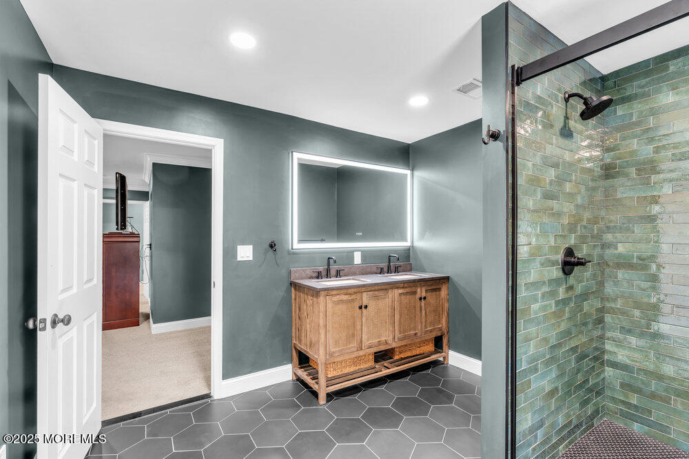 225 East Bird Village Road Jackson, NJ 08527 - Photo 34 of 69 a bathroom with a tub and shower