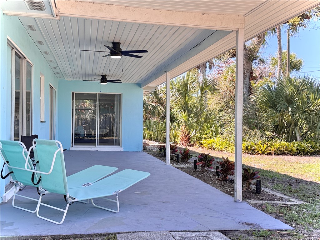 715 Holly Road Vero Beach, FL 32963 - Photo 19 of 25 a room with furniture and a large window