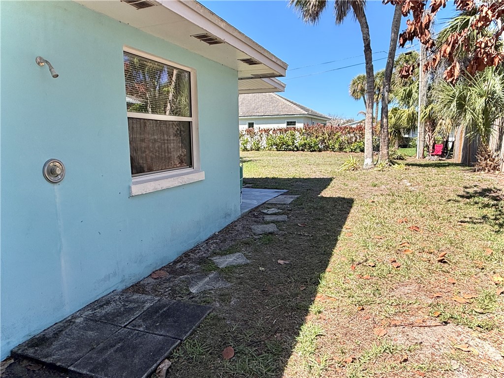 715 Holly Road Vero Beach, FL 32963 - Photo 24 of 25 a view of a backyard of the house