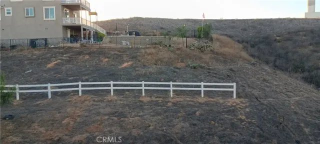 a view of a yard with an outdoor space