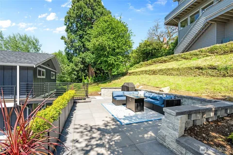 a view of a swimming pool with a lounge chairs