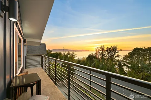 a view of balcony with furniture