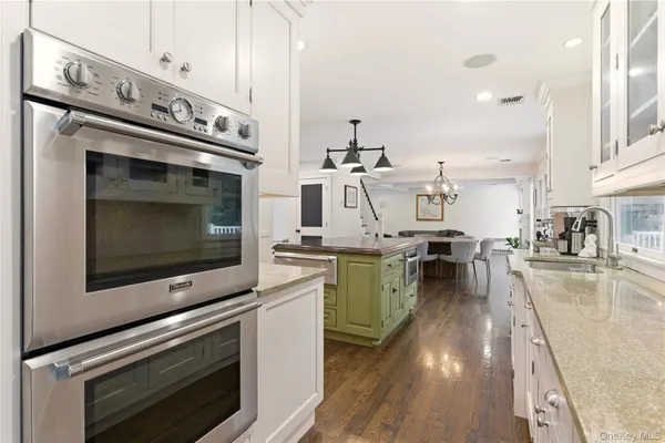 a kitchen with a stove and a microwave