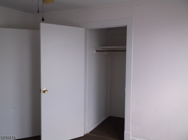 2 Plane Street, Unit C Butler, NJ 07405 - Photo 2 of 9 a view of an empty walk in closet