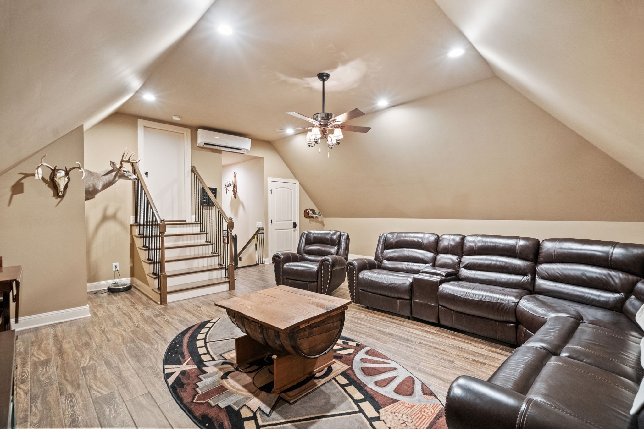 508 Lindsey Hollow Road Gallatin, TN 37066 - Photo 25 of 33 Bonus room above the garage, also with the same luxurious hardwood floor as in the rest of the home. Steps to storage and a walk-in closet to provide even more storage.
