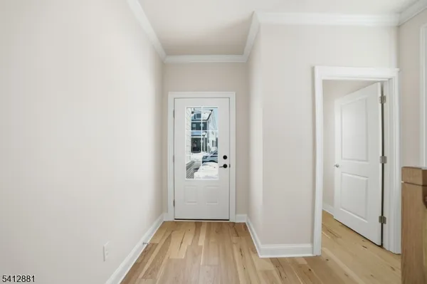 a kitchen with stainless steel appliances a sink stove and refrigerator
