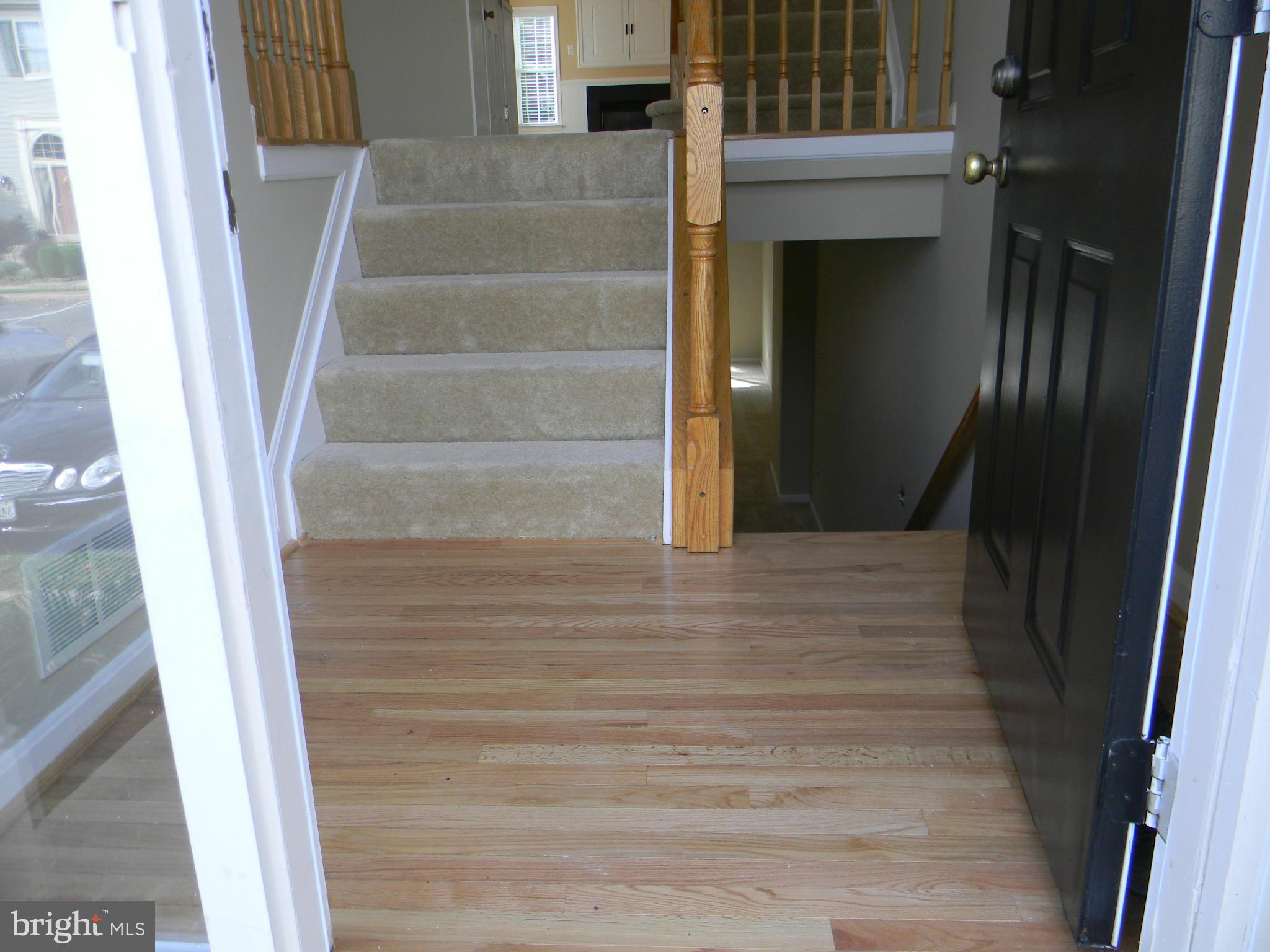 1513 Rambling Way South Frederick, MD 21701 - Photo 4 of 29 GLEAMING HARDWOOD FLOORS IN THE FOYER