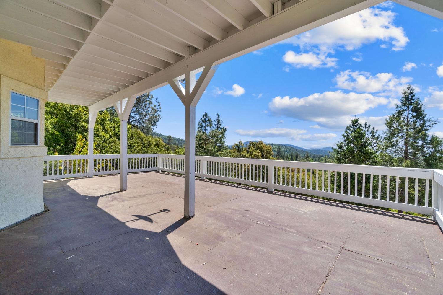 2832 East Westfall Road Mariposa, CA 95338 - Photo 12 of 38 a view of a patio with a backyard